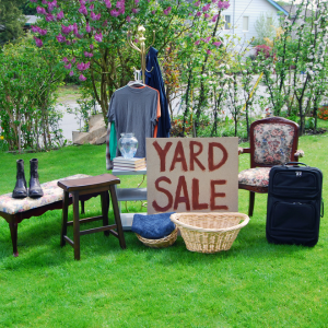 Yard Sale Items displayed on green lawn